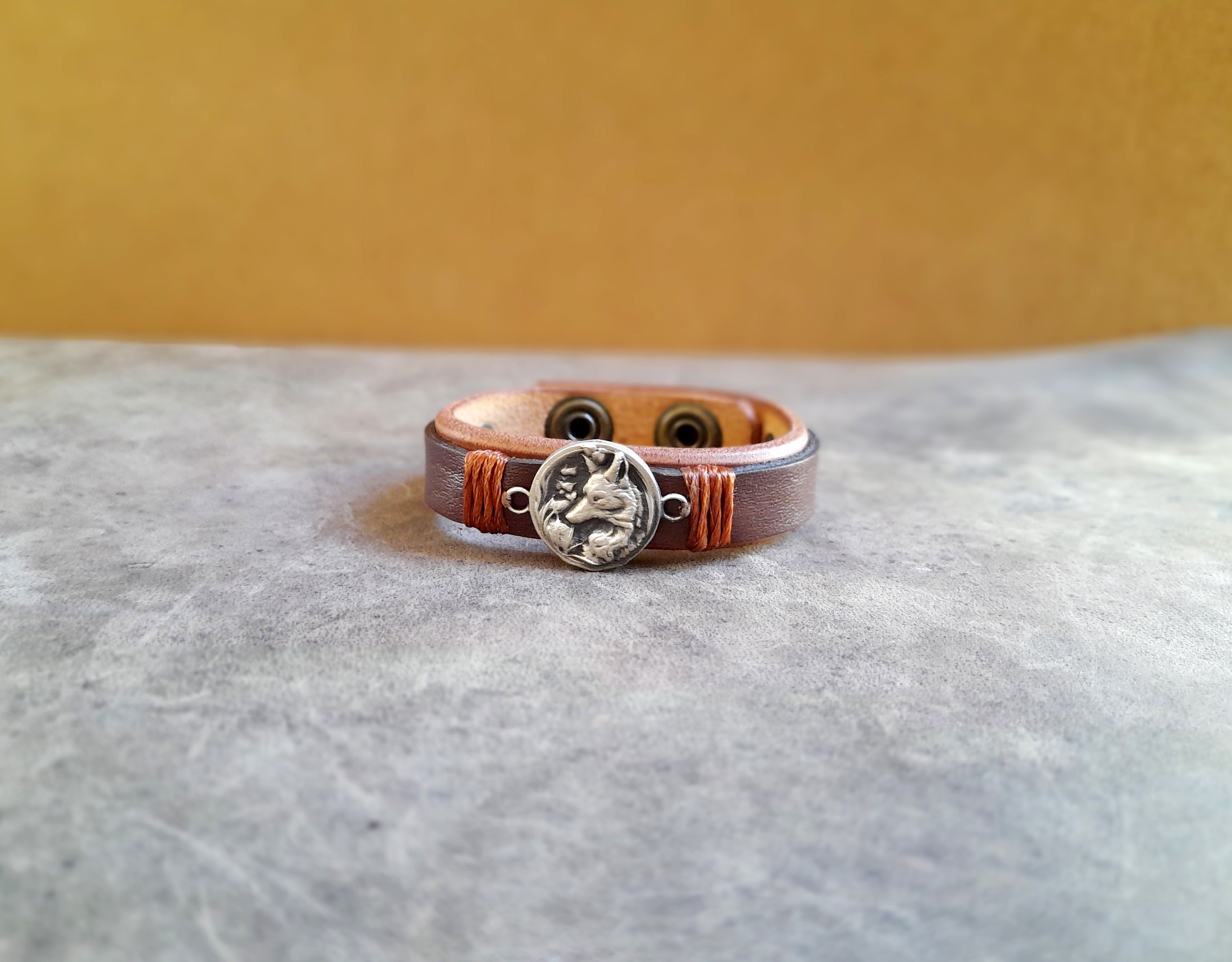 Brown Leather Cuff Bracelet for Women, featuring a handmade oxidized brass forest fox pendant.