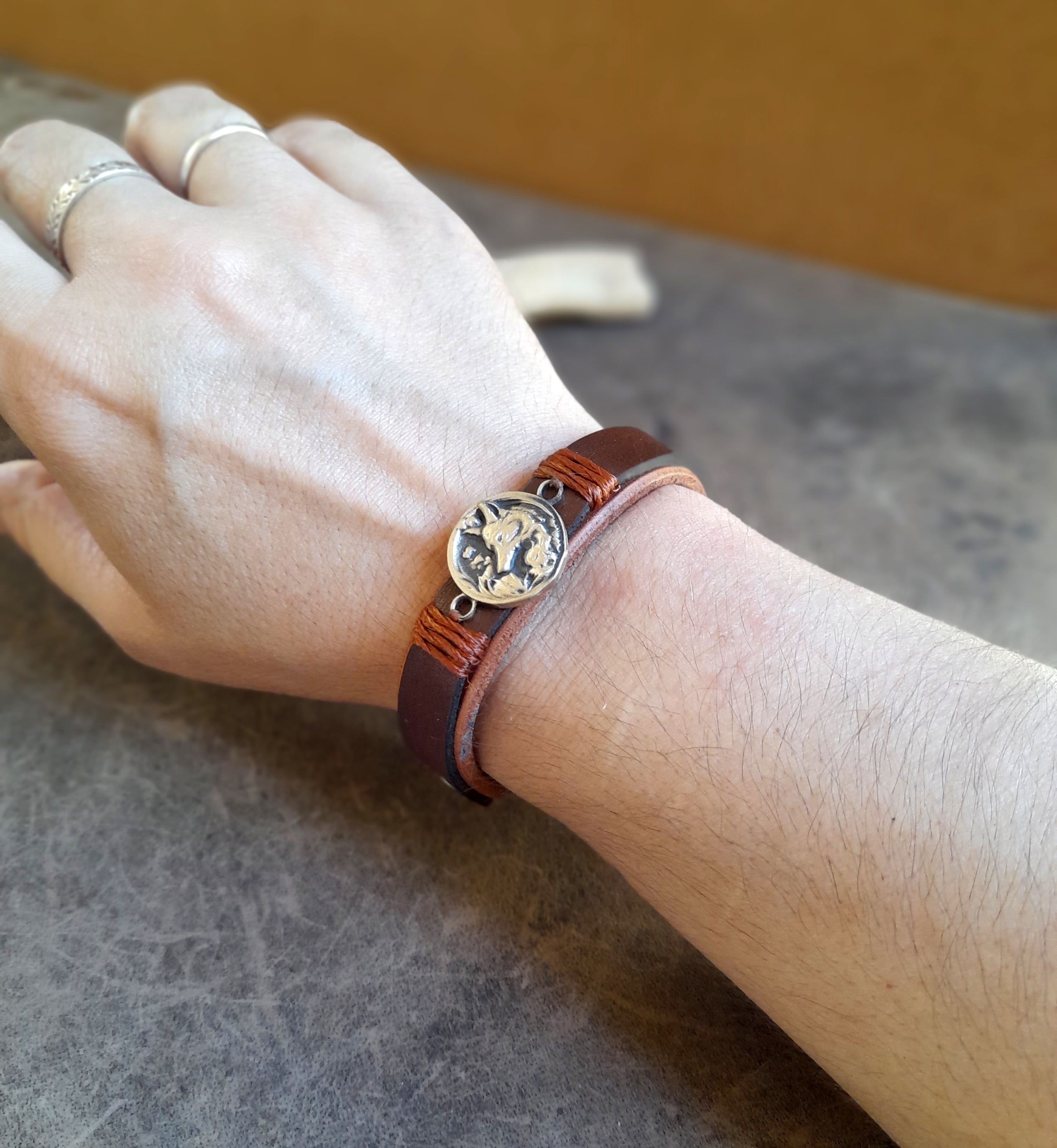 Brown Leather Cuff Bracelet for Women, featuring a handmade oxidized brass forest fox pendant.