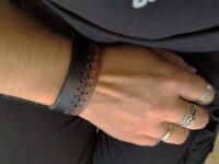 Black Brown Rugged Leather Cuff for Men with X shaped Hand Stitcing all the way around.